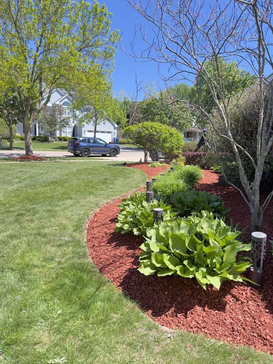Red mulch bed installation
